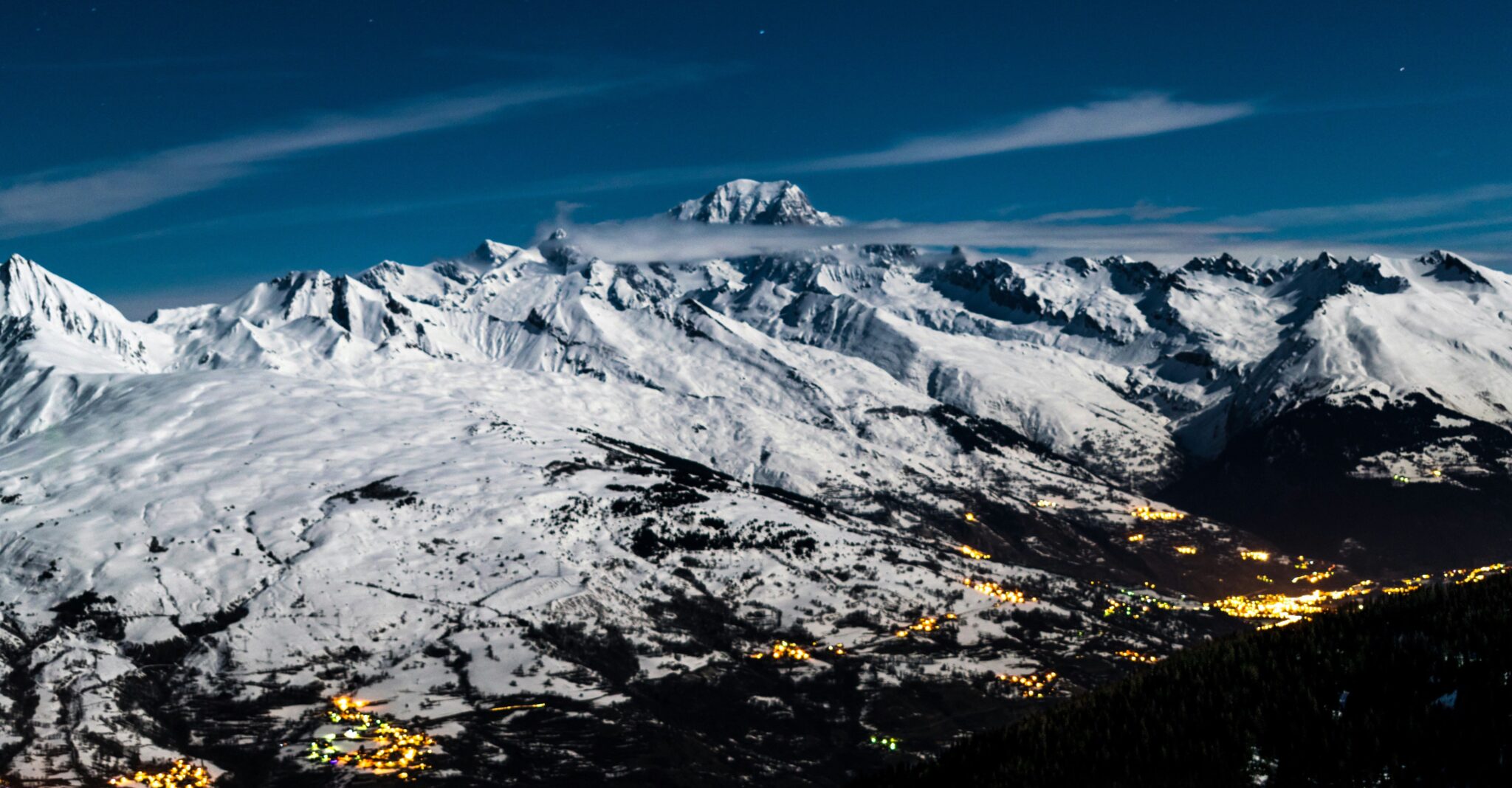 An aerial view of ski stations of la plagne and les arcs by night