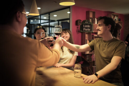 students having a glass of wine