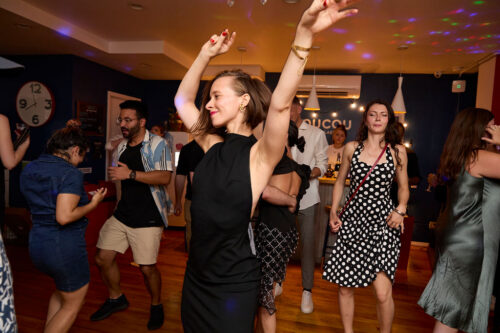 students dancing at a coucou party